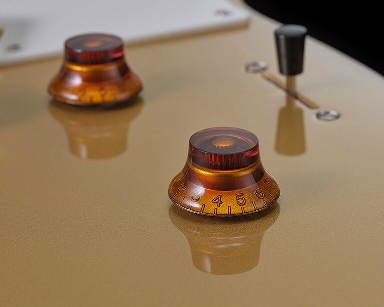 Primer plano de Master Volume, Master Tone y selector de 3 posiciones