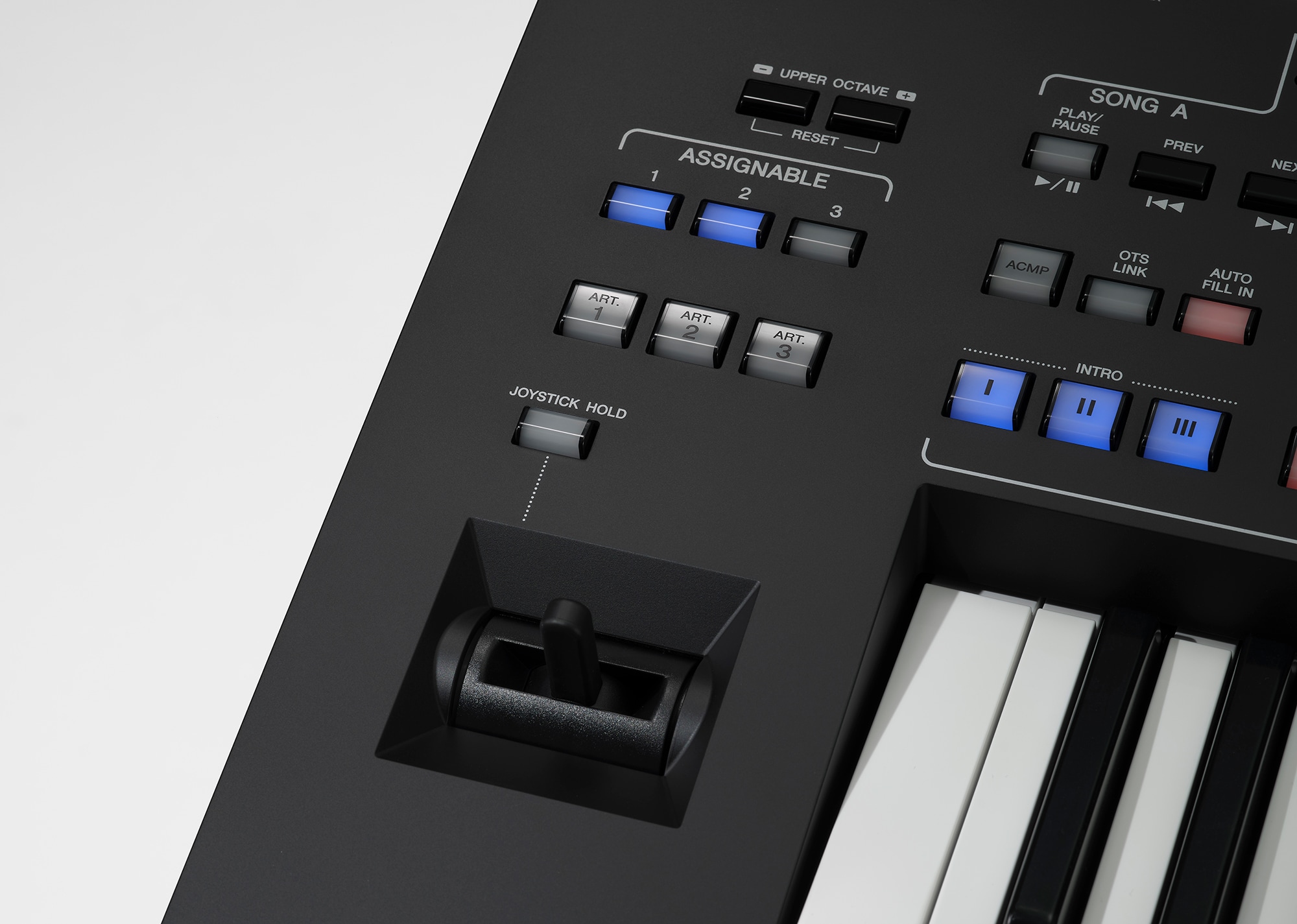 View of the joystick, assignable and articulation buttons on the Genos2 control panel