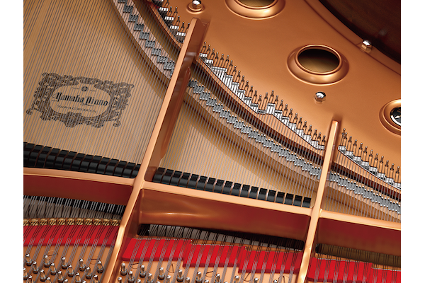 A photo of a Yamaha concert grand piano, CFX