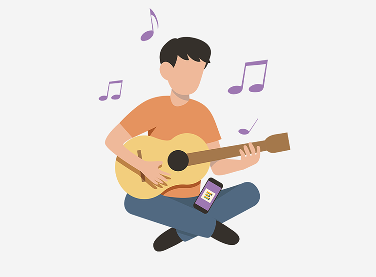 Un hombre utilizando la aplicación de práctica musical Extrack para practicar con diagramas de acordes.